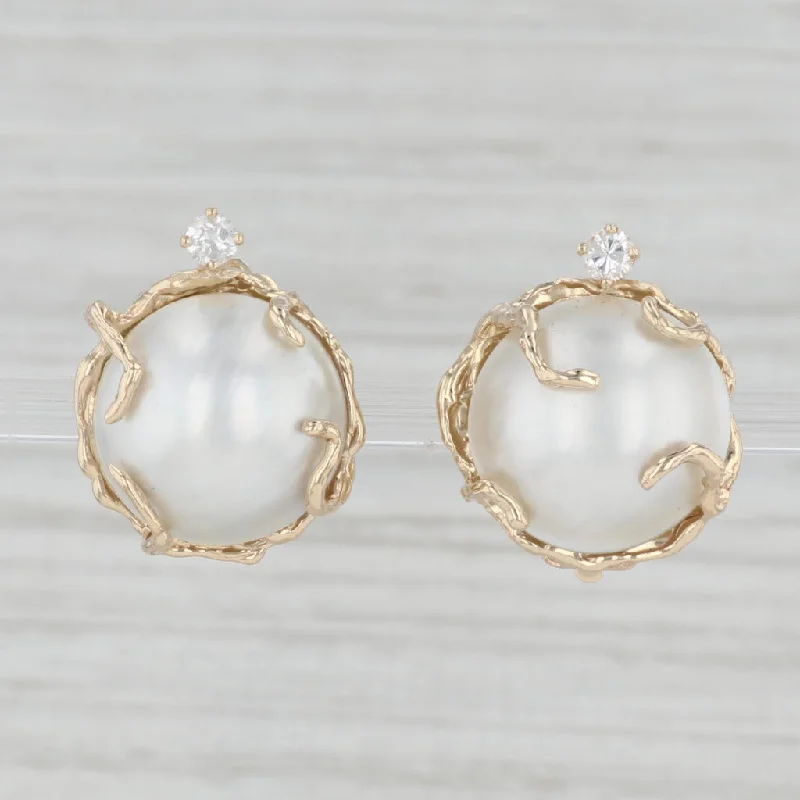 women's earrings with infinity symbol -Round Mabe Pearl 0.20ctw Diamond Clip On Earrings 14k Yellow Gold Non Pierced