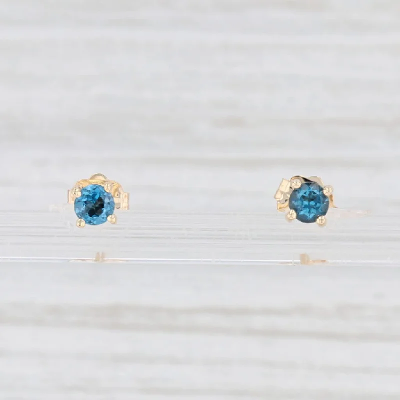 women's earrings with diamond studs -New 0.28ctw London Blue Topaz Stud Earrings 14k Yellow Gold Round Solitaires