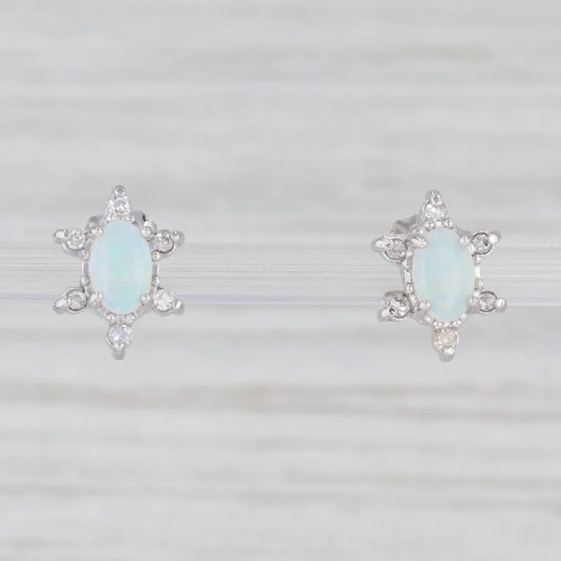 women's earrings with geometric shape -Oval Opal Diamond Halo Stud Earrings 14k White Gold