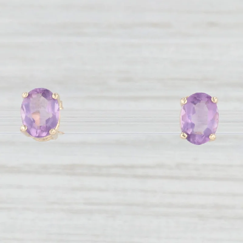 women's earrings with sleek finish -2.05ctw Oval Amethyst Stud Earrings 14k Yellow Gold February Birthstone