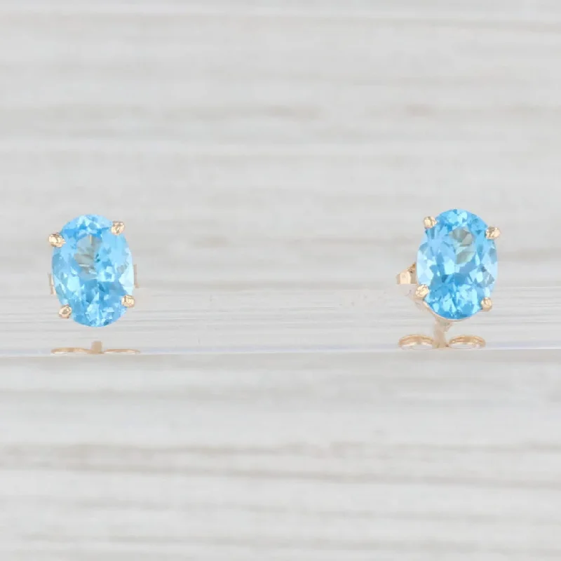 women's earrings with multi-layered design -2.10ctw Oval Blue Topaz Solitaire Stud Earrings 14k Yellow Gold Pierced Studs