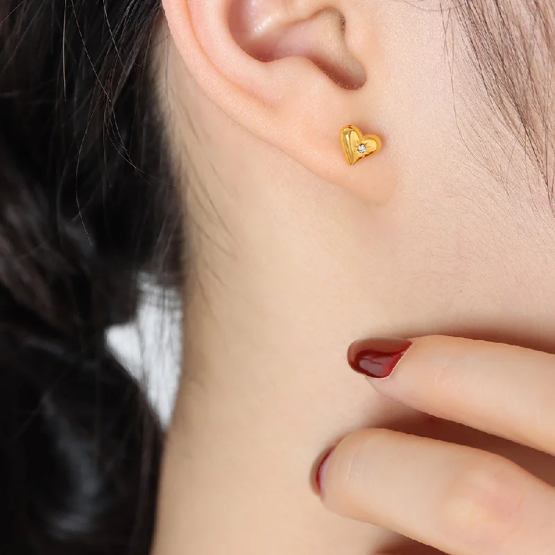 Gold stud earrings