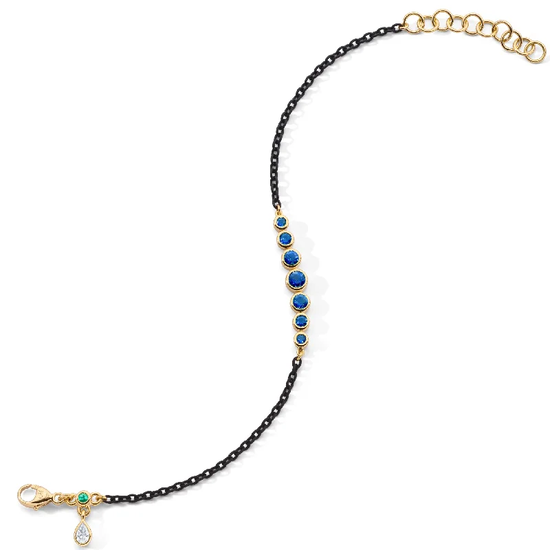 women's bracelets with opal -Bezel Set Round Blue Sapphire and Black Steel Tennis Bracelet