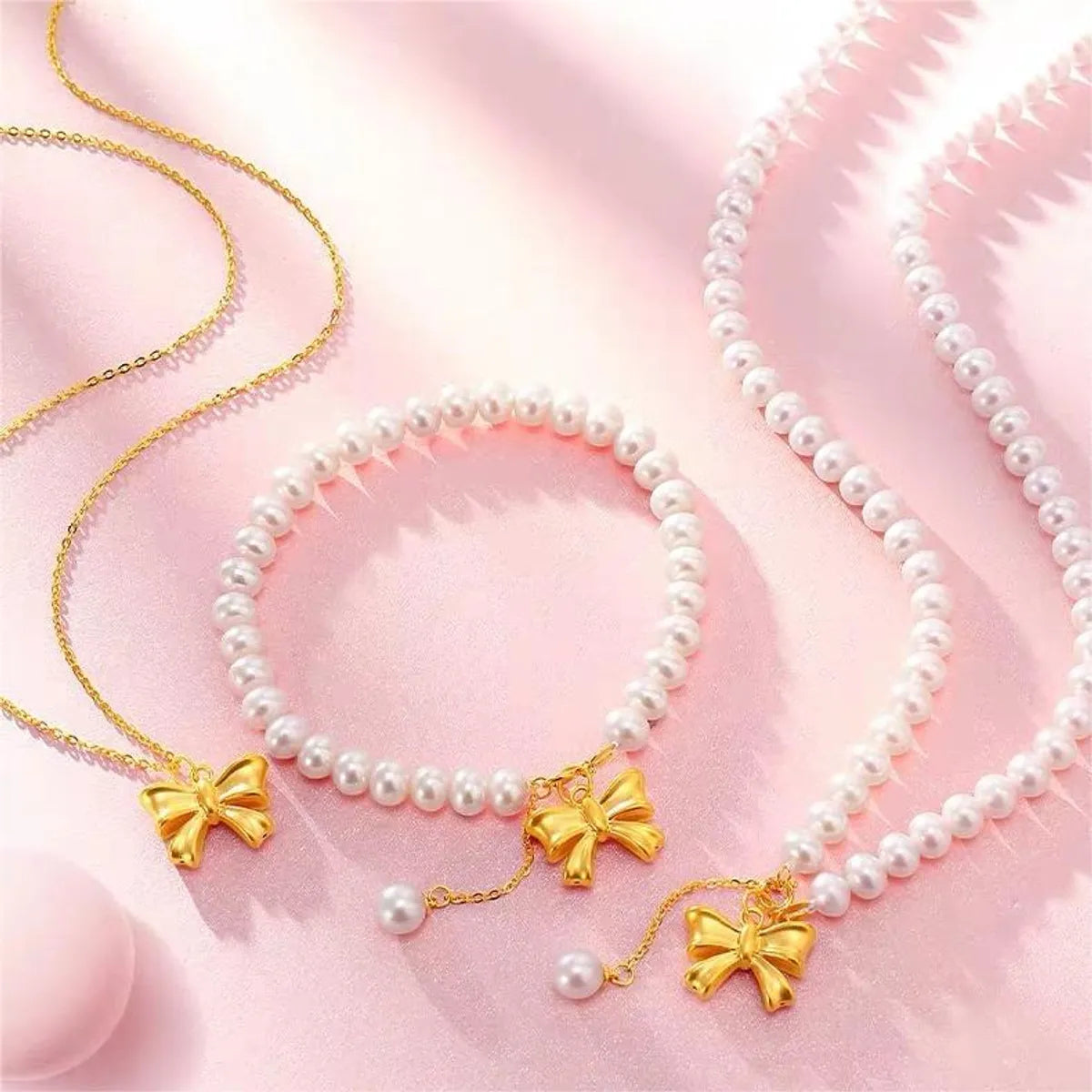 women's bracelets gold -Elegant Sweet Bow Knot Imitation Pearl Copper Beaded Plating Women's Bracelets Necklace